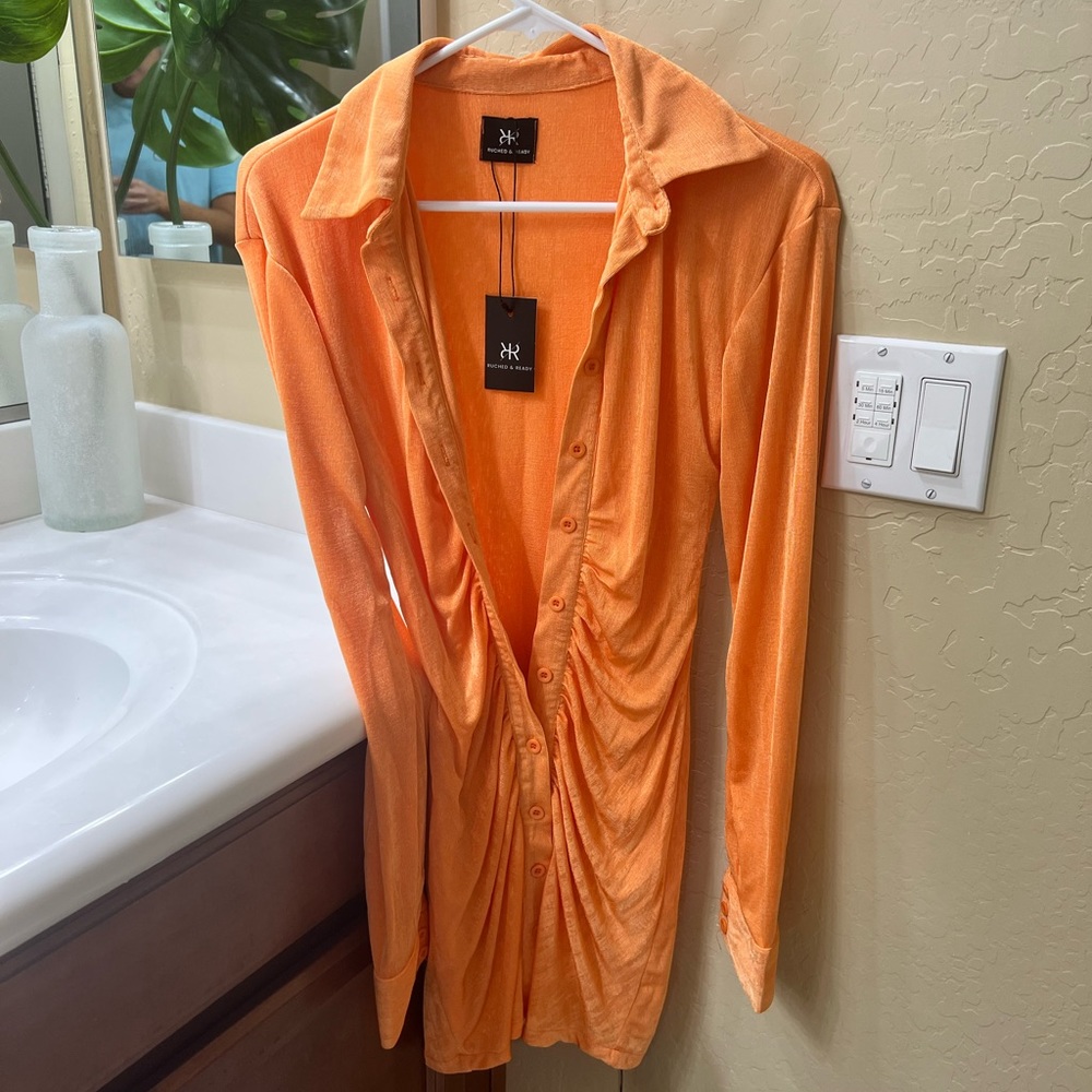 I’m style button up dress. Fitted and sexy!